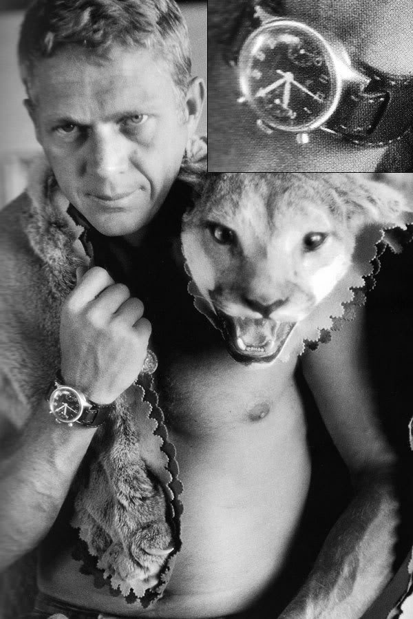 Steve McQueen memakai jam tangan dengan bund strap